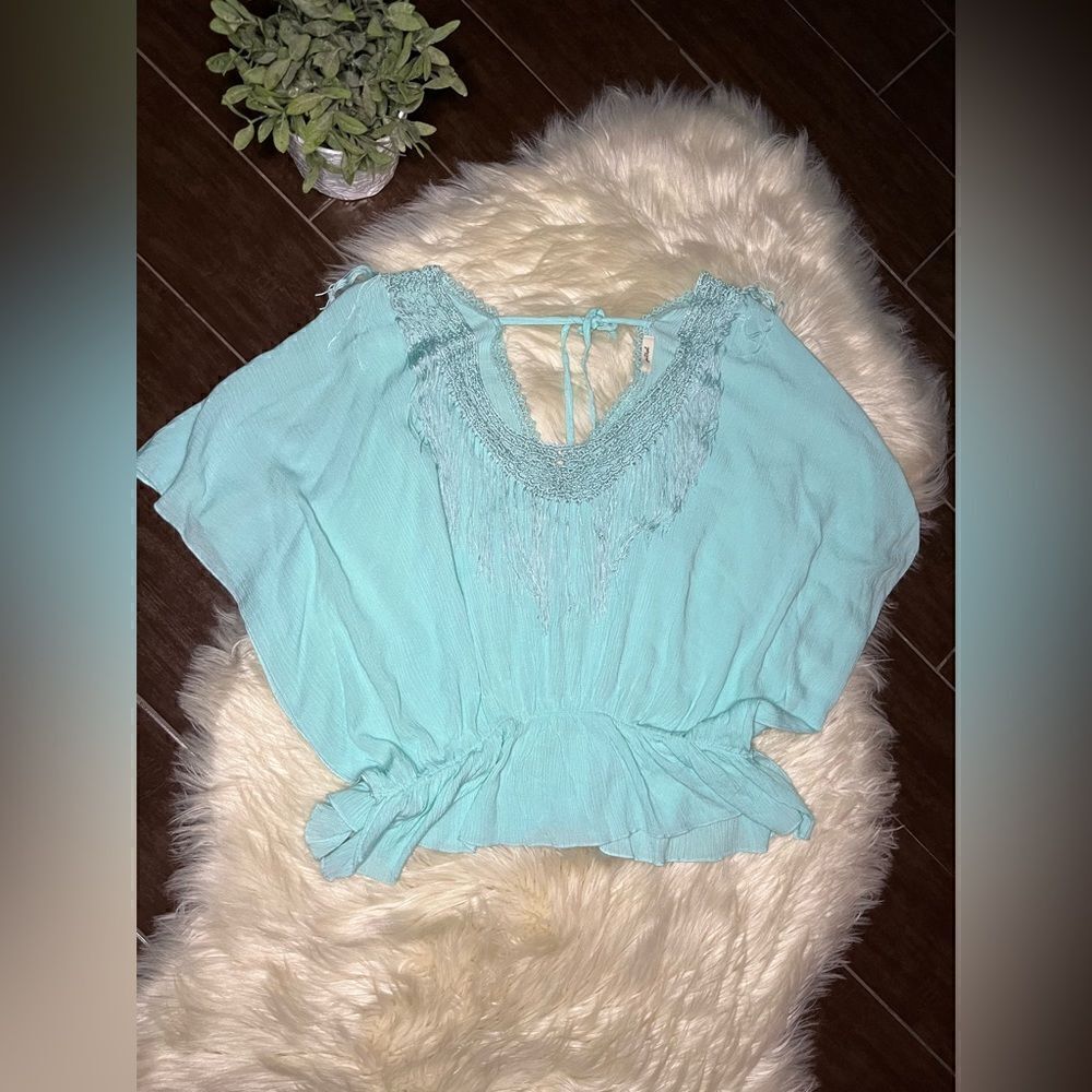 Petrol fringe batwinged blouse sz large